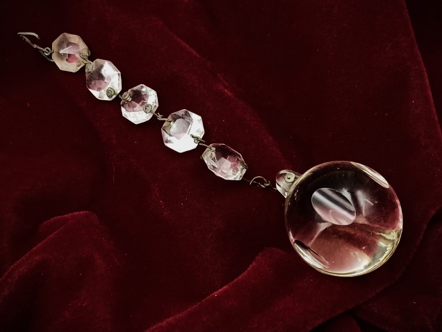 Glass chandelier ball with 5 buttons