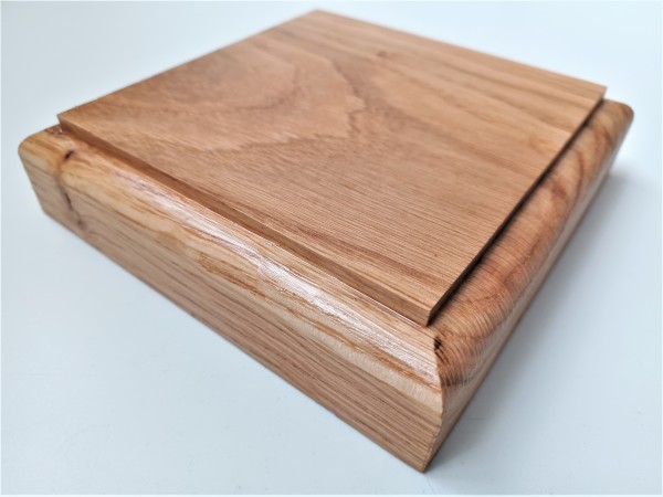 Thick square ceiling pattress manufactured from Oak. Approx. width 125mm oiled