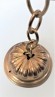 Antique pressed brass ceiling rose cap and gilded chain